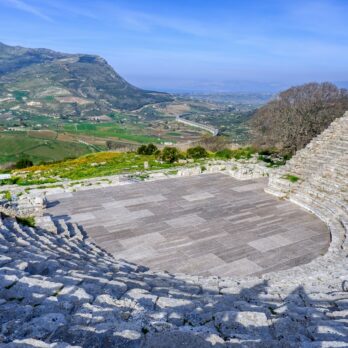 a stone amphit with a view of a valley
