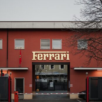 a red building with a sign on the front of it